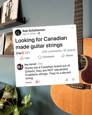 Guitar with a social media post about looking for Canadian-made guitar strings.